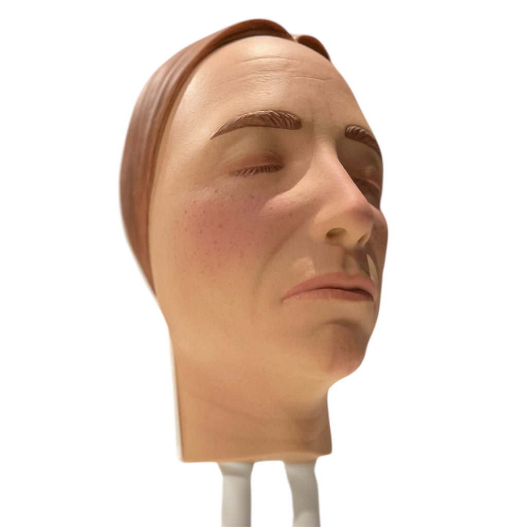 Model af ansigtet til injektionstræning - yngre kvinde