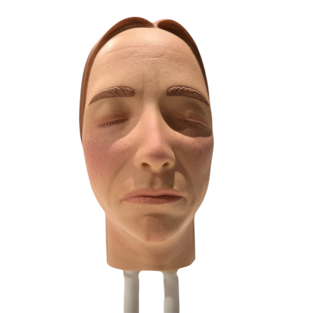 Model af ansigtet til injektionstræning - yngre kvinde